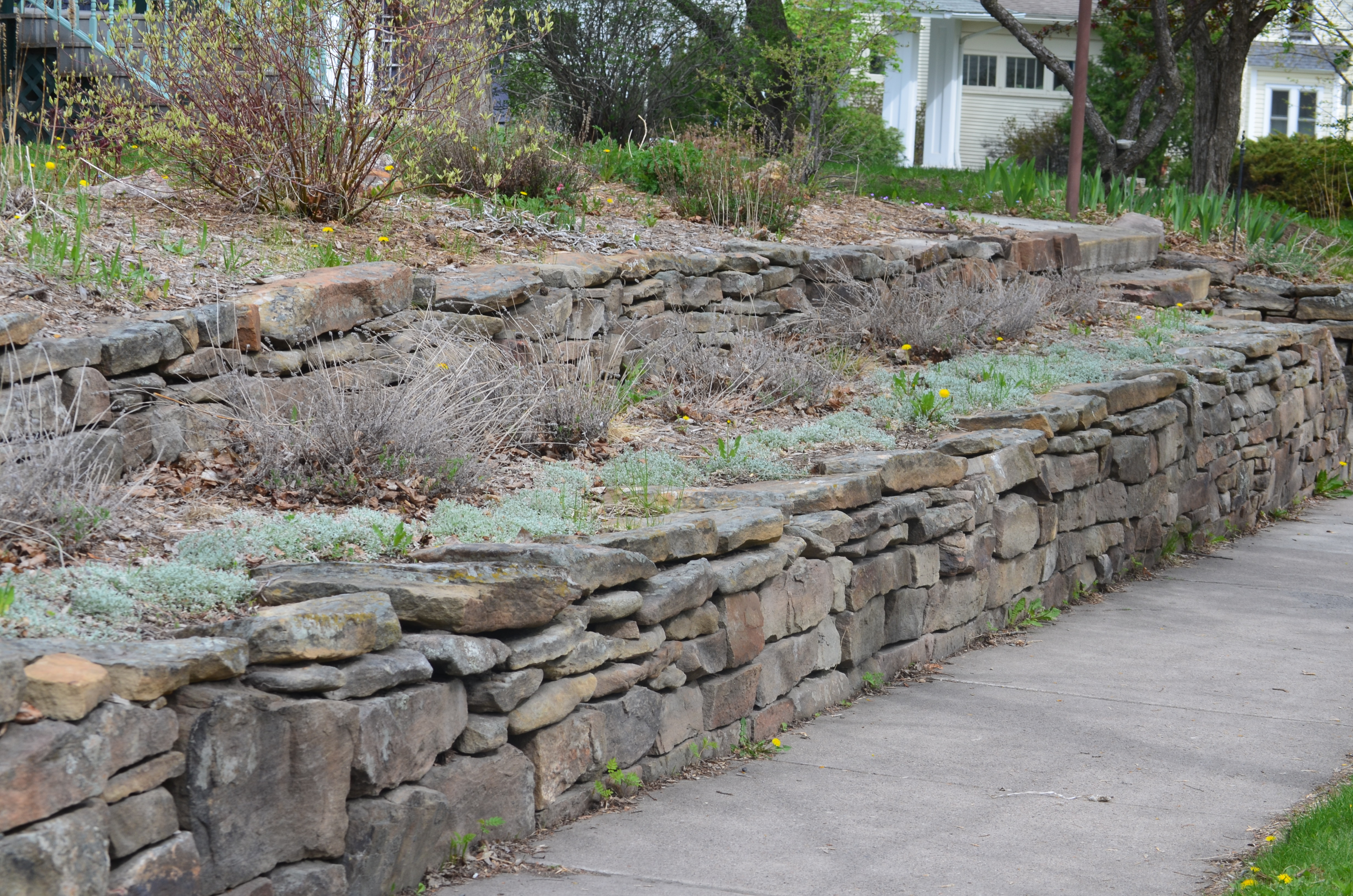 Large 2 tiered retaining wall in Historic Bozeman.